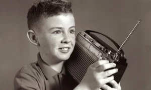 1960s boy listening to portable radio vintage images